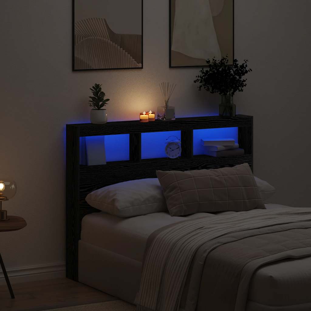 Skrinka na čelo postele s LED čierna dub 140x17x102 cm