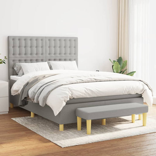 Boxspring posteľ s matracom bledosivý 140x190 cm látka
